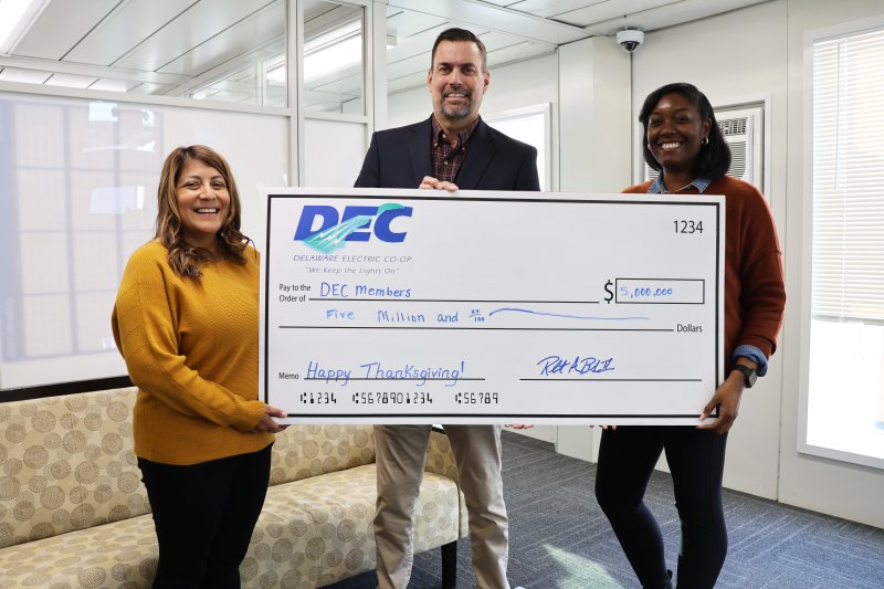 Delaware Electric Cooperative team members announcing the return of $5 million to members are (l-r) Ivanessa Cay, manager of member services; Rob Book, president and CEO; and Amber Cannon, junior accounting clerk for capital credits and payroll.